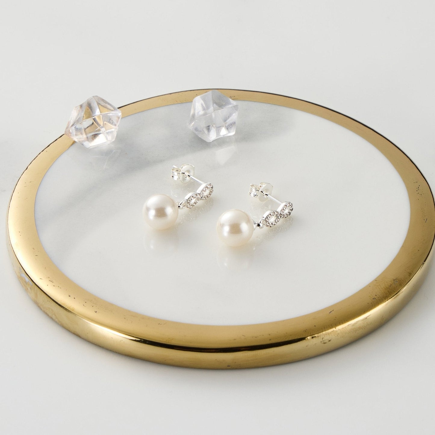 Silver Plated Infinity Pearl Drop Earrings Created with Zircondia® Crystals