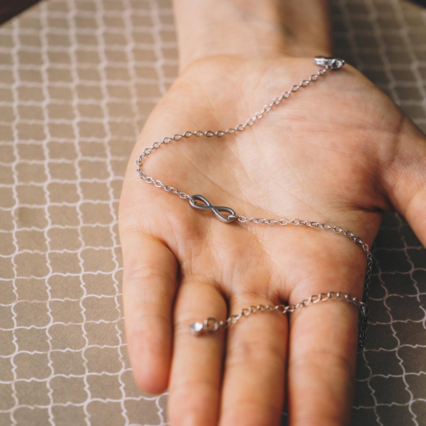 Silver Plated Infinity Anklet Created with Zircondia® Crystals