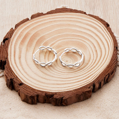 Silver Plated Infinity Hoop Earrings Created with Zircondia® Crystals