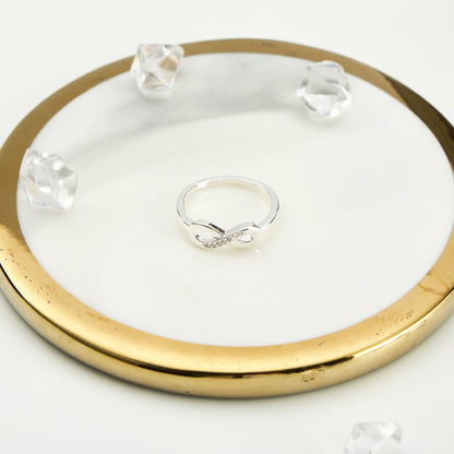 Silver Plated Infinity Ring Created with Zircondia® Crystals