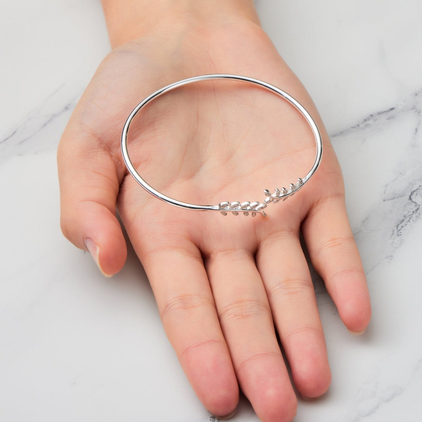 Silver Plated Leaf Bangle Created with Zircondia® Crystals