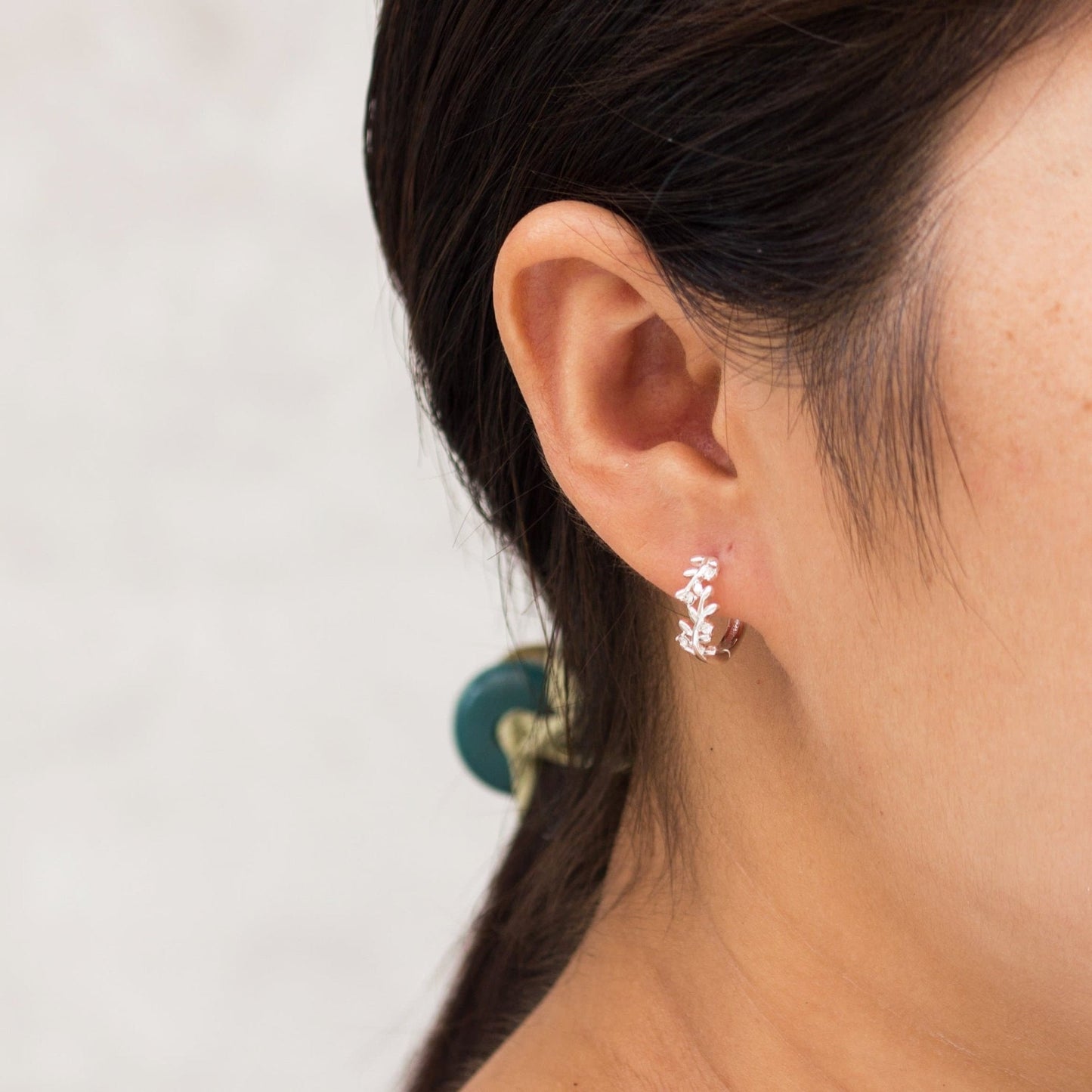 Silver Plated Leaf Hoop Earrings Created with Zircondia® Crystals