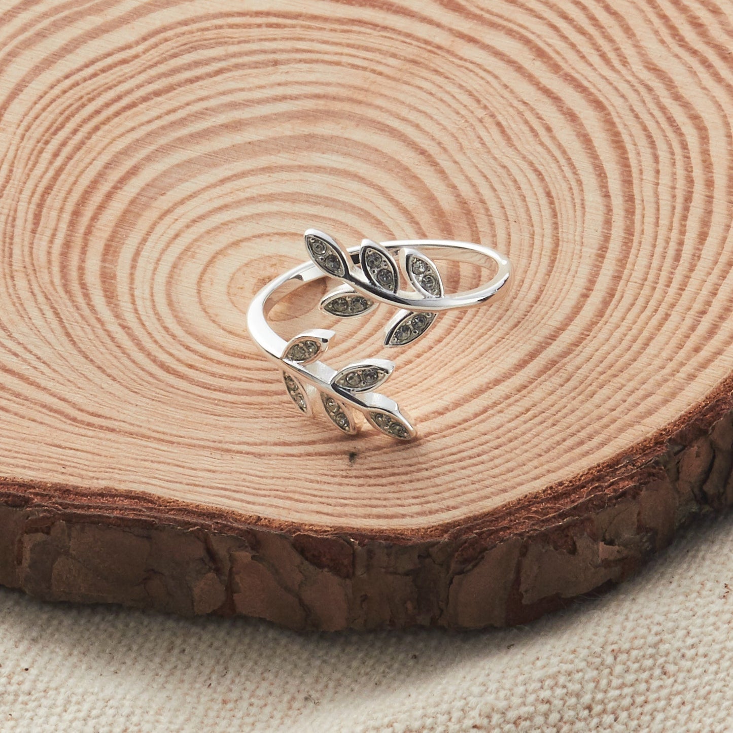 Silver Plated Leaf Ring Created with Zircondia® Crystals