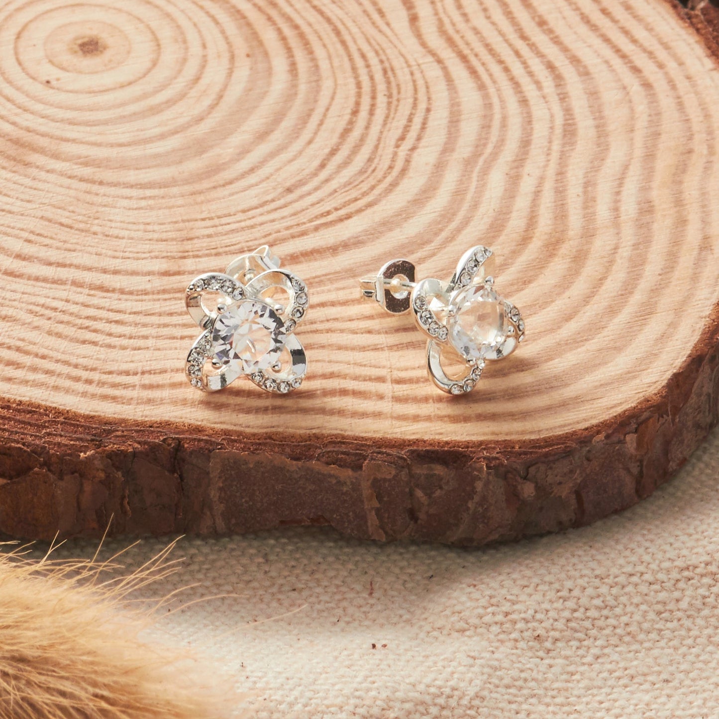 Silver Plated Orbit Earrings Created with Zircondia® Crystals