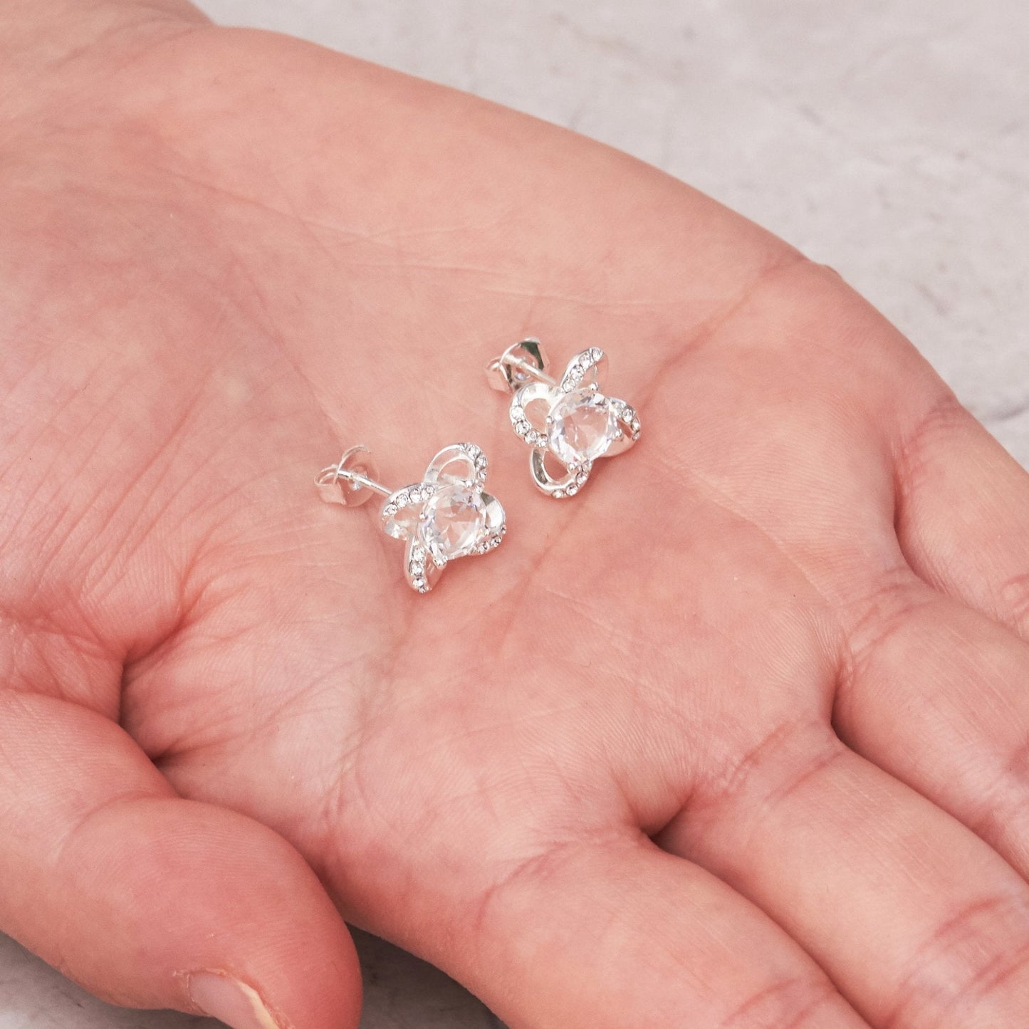 Silver Plated Orbit Earrings Created with Zircondia® Crystals