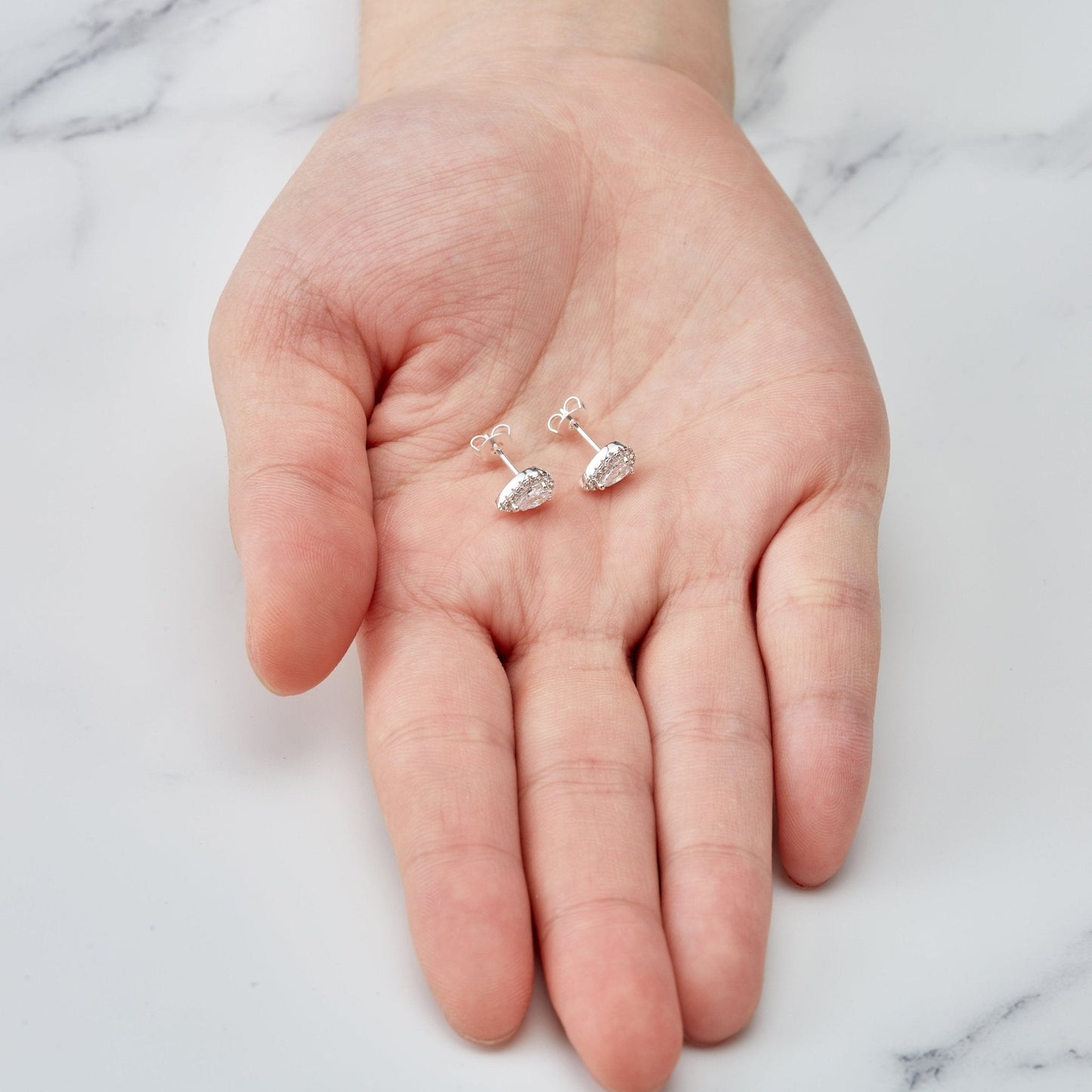 Silver Plated Pear Halo Earrings Created with Zircondia® Crystals