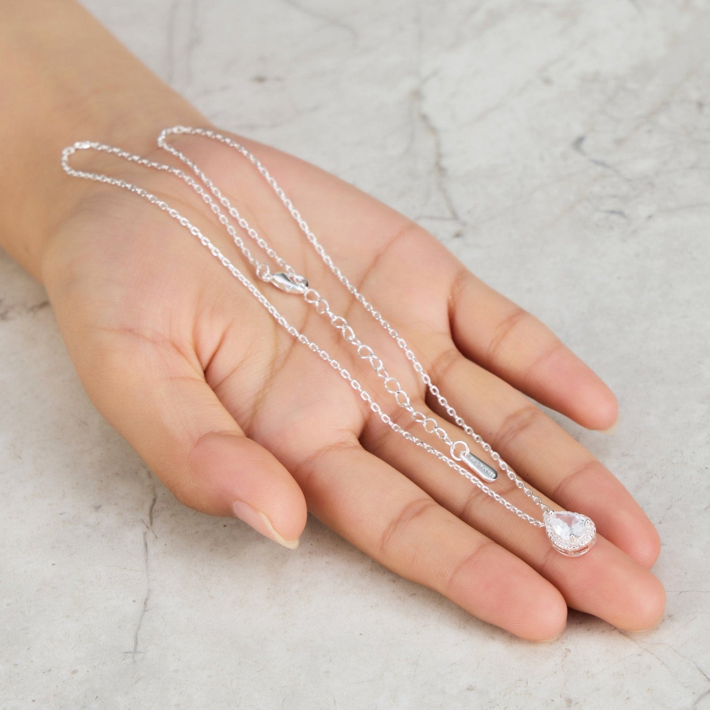 Silver Plated Pear Halo Necklace Created with Zircondia® Crystals