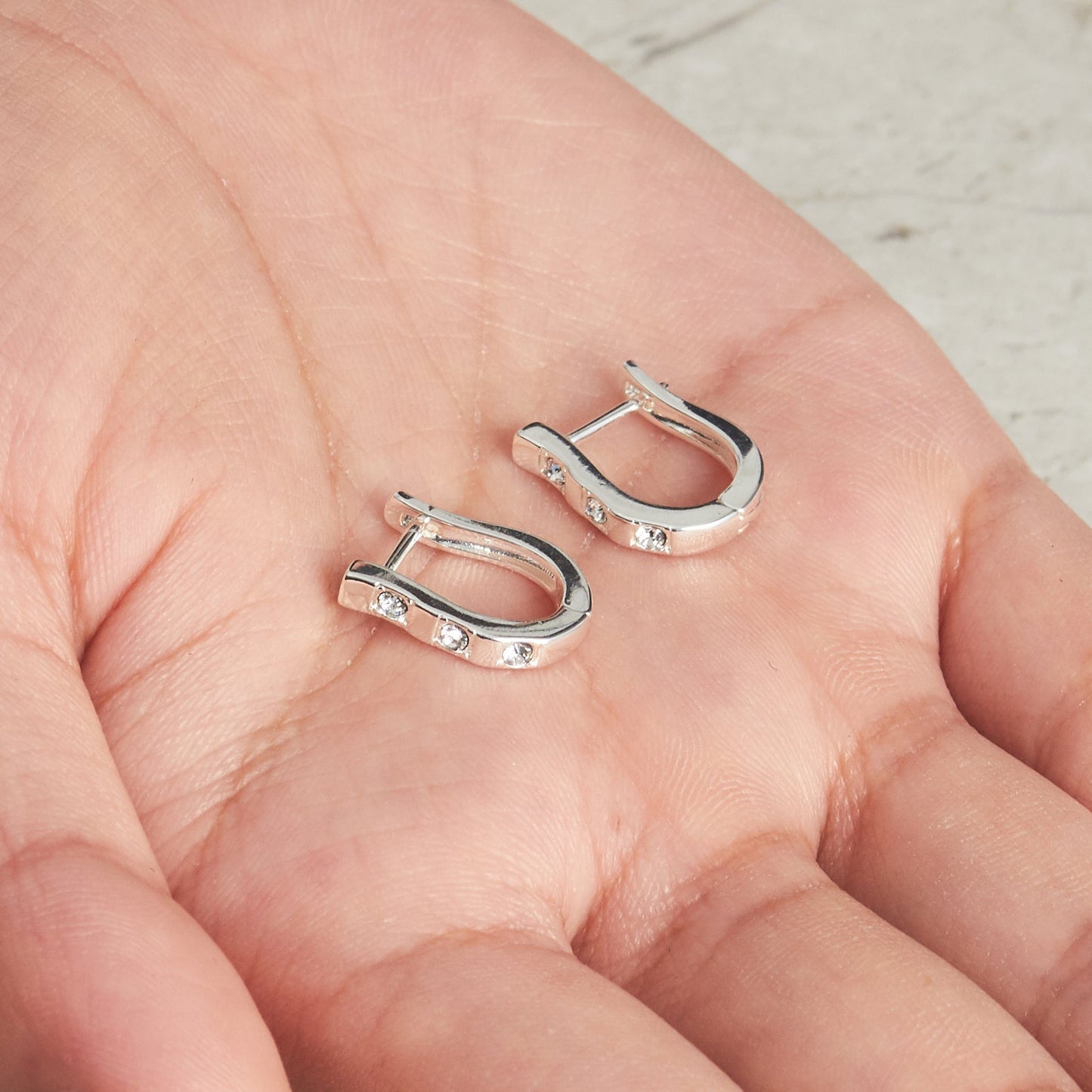 Silver Plated Three Stone Hoop Earrings Created with Zircondia® Crystals