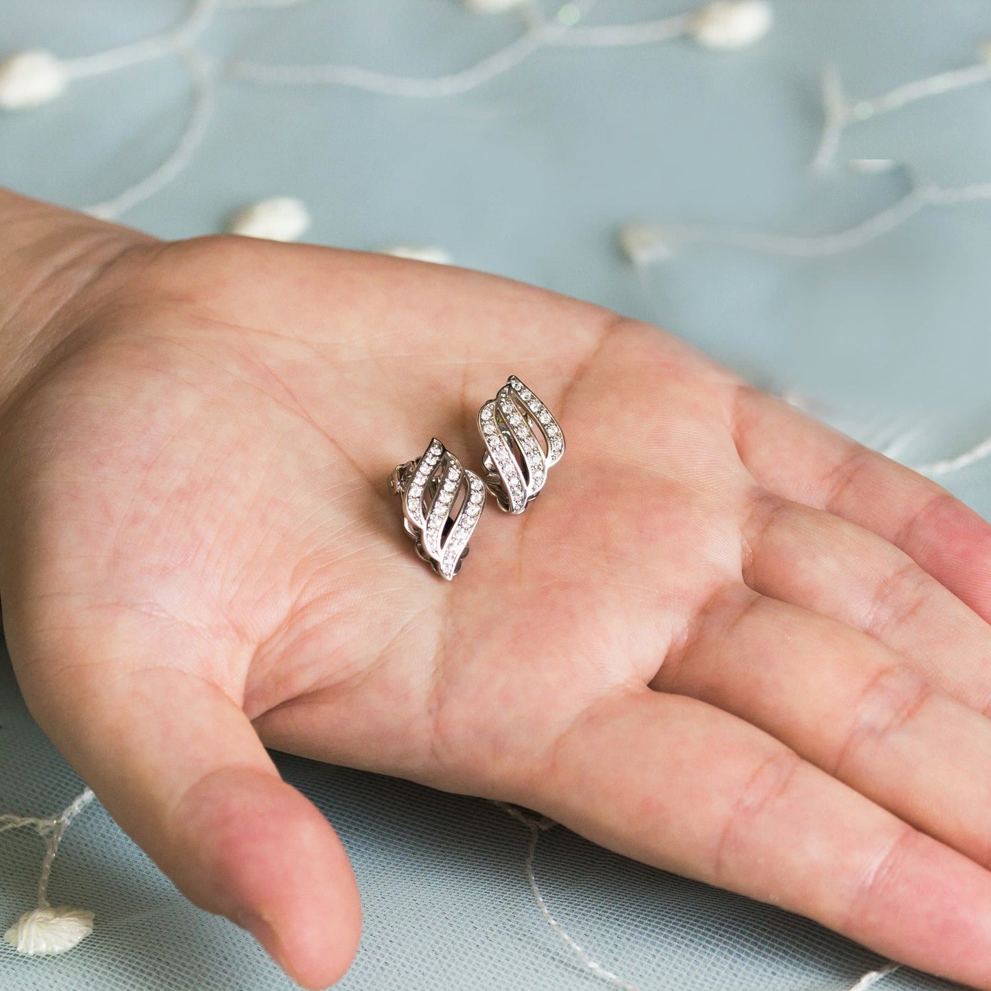 Silver Plated Triple Row Clip On Earrings Created with Zircondia® Crystals