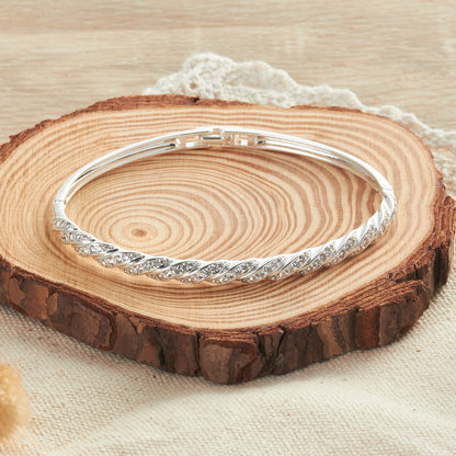 Silver Plated Twist Bangle Created with Zircondia® Crystals (7 Inch)