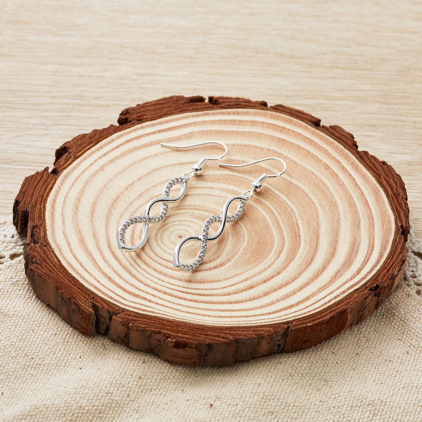 Silver Plated Twist Drop Earrings Created with Zircondia® Crystals