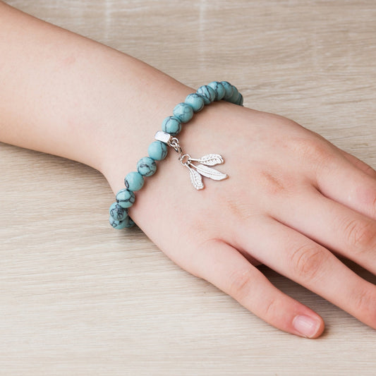 Synthetic Turquoise Gemstone Stretch Bracelet with Charm Created with Zircondia® Crystals