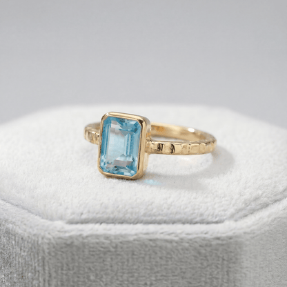 Tidewashed Sky Blue Topaz Ring – Octagonal Gemstone & Hammered Band