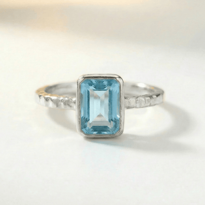 Tidewashed Sky Blue Topaz Ring – Octagonal Gemstone & Hammered Band