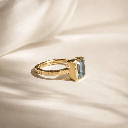 Tidewashed Sky Blue Topaz Ring – Octagonal Gemstone & Hammered Band
