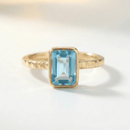 Tidewashed Sky Blue Topaz Ring – Octagonal Gemstone & Hammered Band