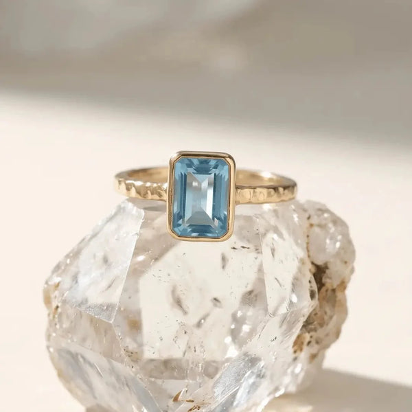 Tidewashed Sky Blue Topaz Ring – Octagonal Gemstone & Hammered Band