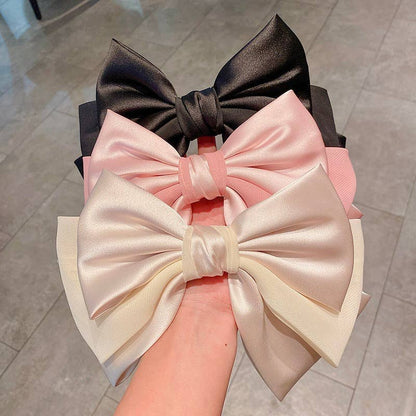 Triple satin bow hair clip